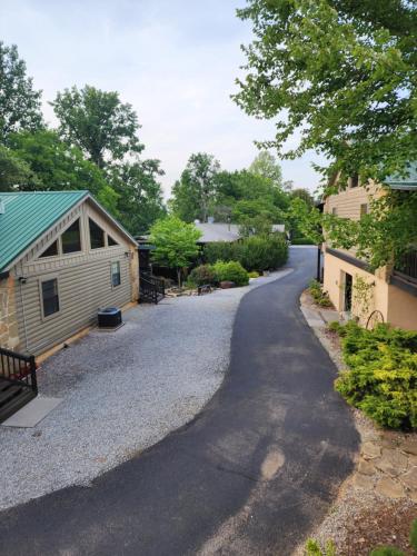a driveway leading to a garage and a house at Lodge At Tellico in Tellico Plains