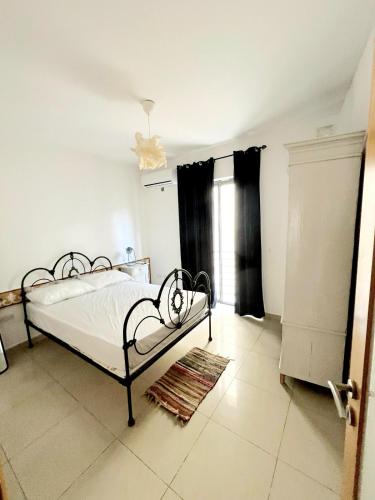 Cama o camas de una habitación en Excellent location bright sliema tigne apartment
