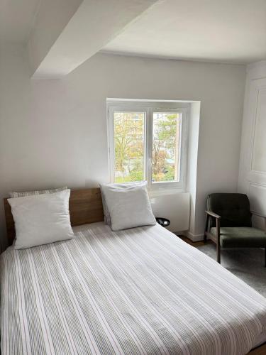 Postel nebo postele na pokoji v ubytování Residence MH Lyon