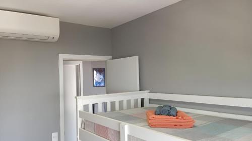 En eller flere senge i et værelse på Resort, Piscina e Natureza em SP