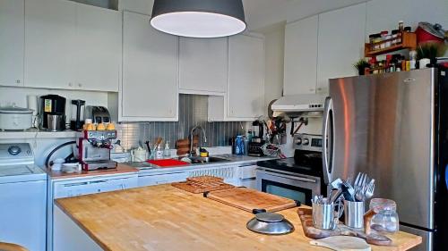 Kuchyň nebo kuchyňský kout v ubytování Urbanity et cosy