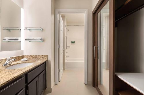 a bathroom with a sink and a shower at Residence Inn Atlanta Duluth Gwinnett Place in Duluth