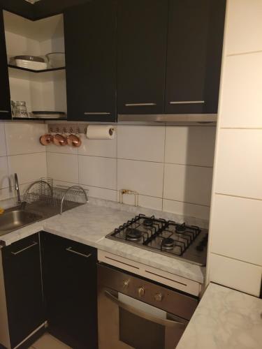Dapur atau dapur kecil di 103 dpto a 15 minutos de Aeropuerto frente mall Maipú