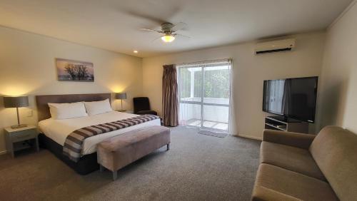 Postel nebo postele na pokoji v ubytování Manukau Motor Lodge
