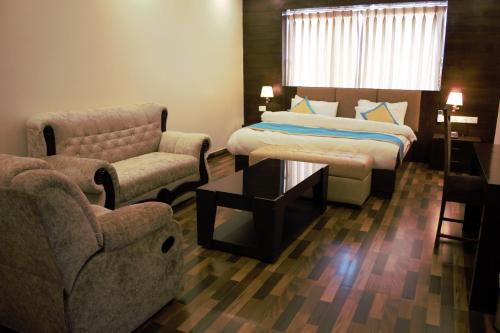 Postel nebo postele na pokoji v ubytování Hotel Tulip Pvt Ltd