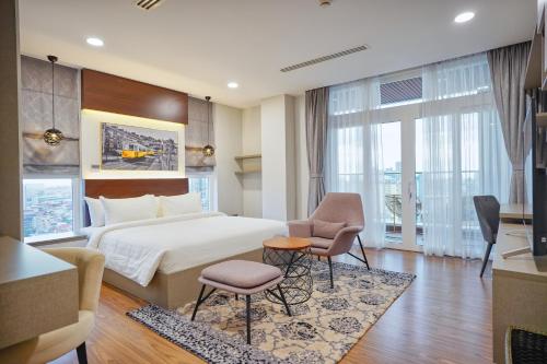 Postel nebo postele na pokoji v ubytování URBAN PALACE