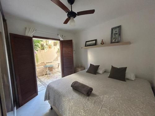 Ένα ή περισσότερα κρεβάτια σε δωμάτιο στο Casa Alves