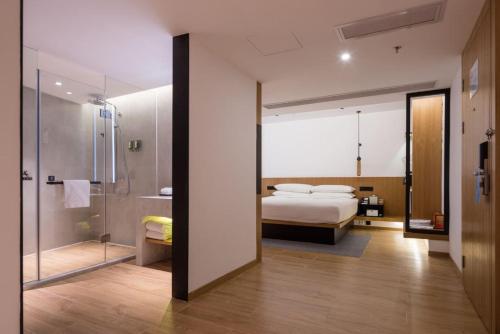 Cama o camas de una habitación en Fairfield by Marriott Guangzhou Tianhe Park
