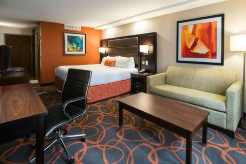 Кровать или кровати в номере The Great Rivers, an Ascend Collection Hotel