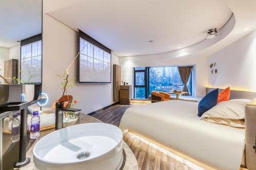 Postel nebo postele na pokoji v ubytování Cozylife Hotel Canal