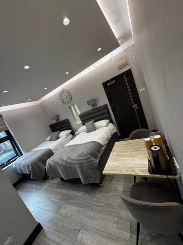 Postel nebo postele na pokoji v ubytování Park Avenue Hotel