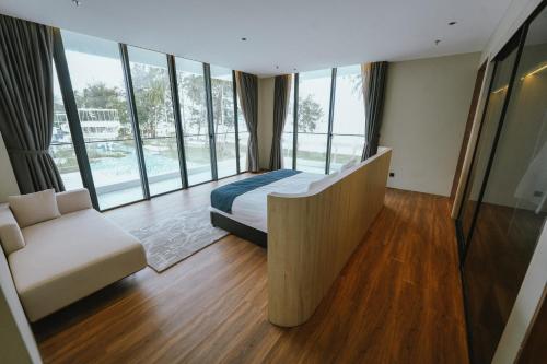 Una cama o camas en una habitación de Roxy Beach Resort