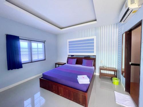 Postel nebo postele na pokoji v ubytování Navy Resort