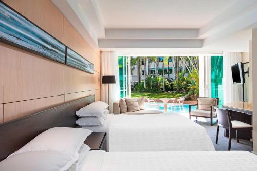 Postel nebo postele na pokoji v ubytování Sheraton Grand Mirage Resort Gold Coast