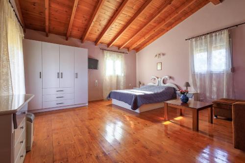 Katil atau katil-katil dalam bilik di Harmony Country House