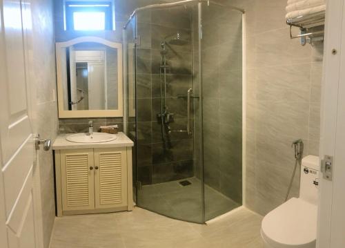 Koupelna v ubytování Maya Hotel 2