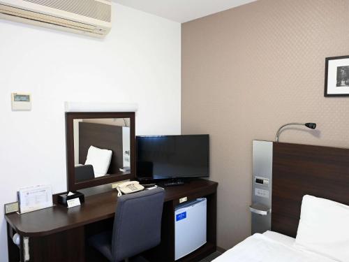 Μια τηλεόραση ή/και κέντρο ψυχαγωγίας στο Comfort Hotel Sendai West