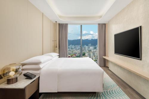 Μια τηλεόραση ή/και κέντρο ψυχαγωγίας στο Lishui Marriott Hotel