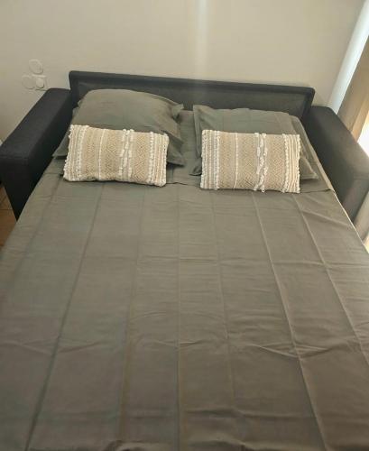 Postel nebo postele na pokoji v ubytování TROPIC Appartements PREMIUM village vacances vue mer Guadeloupe St Anne