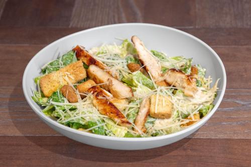 a white bowl of salad with meat and lettuce at Residence Inn by Marriott Oklahoma City Norman in Norman