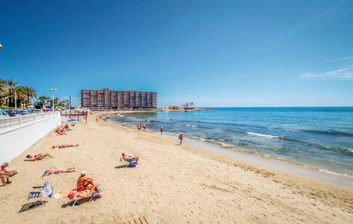 Lovely Apartment In Torrevieja With Swimming Pool