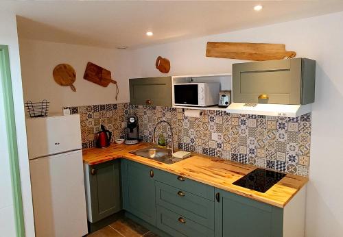 Dapur atau dapur kecil di Perrutel - entre Bastide et cité