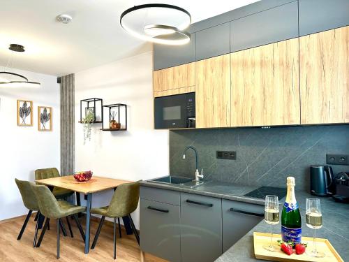 Kuchyň nebo kuchyňský kout v ubytování Residence Barrique Valtice - private wellness