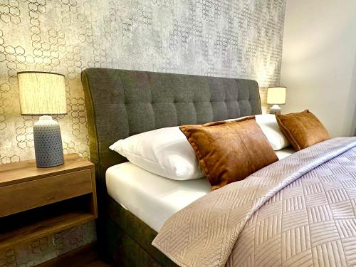 Postel nebo postele na pokoji v ubytování Residence Barrique Valtice - private wellness