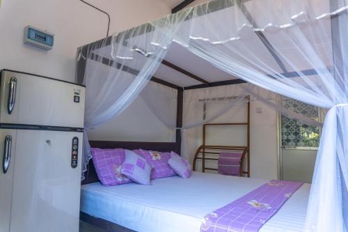 Postel nebo postele na pokoji v ubytování DKC Apartment