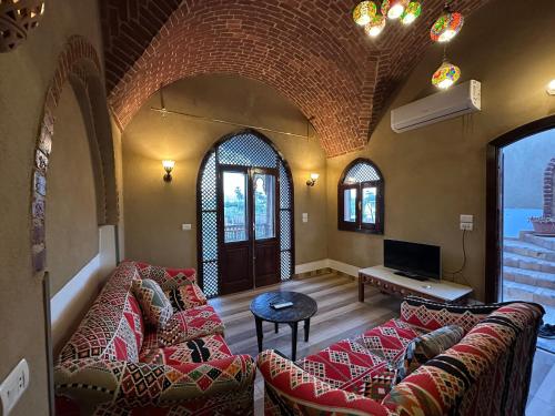 Posezení v ubytování Sheherazade Hotel Nile Villa