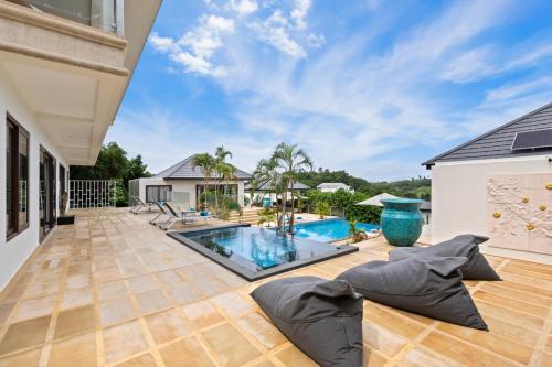 an image of a villa with a swimming pool at Here and Now - Luxury Sea view & Spa Villa in Koh Samui 