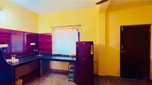 Kuchyň nebo kuchyňský kout v ubytování Deepti Guest House
