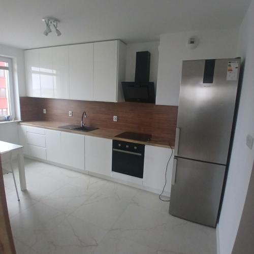 Dapur atau dapur kecil di Apartament Popiełuszki