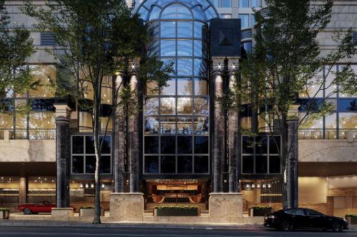 a building with a table in front of it at Sheraton Grand Sydney Hyde Park in Sydney