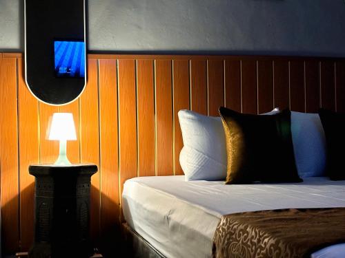 Katil atau katil-katil dalam bilik di Jogja Day Inn