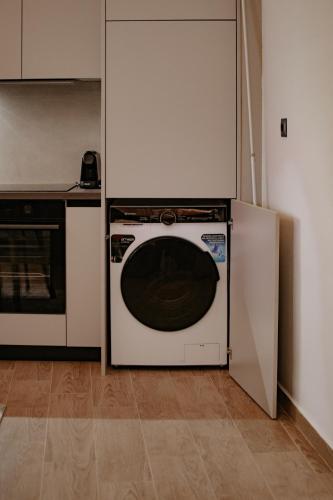 Η κουζίνα ή μικρή κουζίνα στο Apartment 64