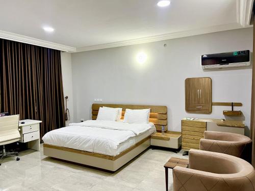 Postel nebo postele na pokoji v ubytování Coshelter Apartments