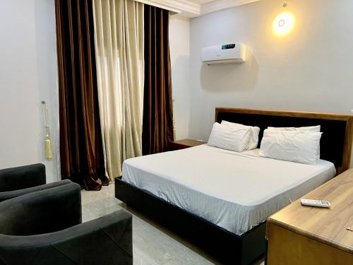Postel nebo postele na pokoji v ubytování Coshelter Apartments