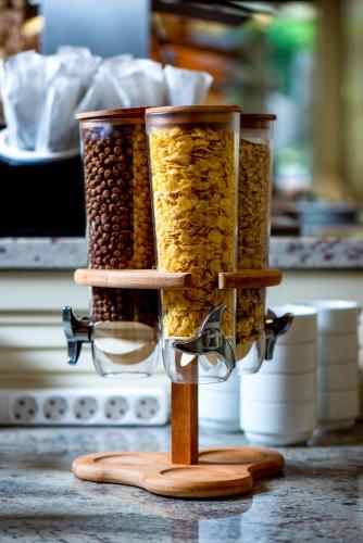 a group of three containers of food on a counter at Siena Palace in Primorsko
