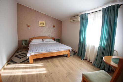 Ein Bett oder Betten in einem Zimmer der Unterkunft Konak Vukasinovic - FREE PARKING