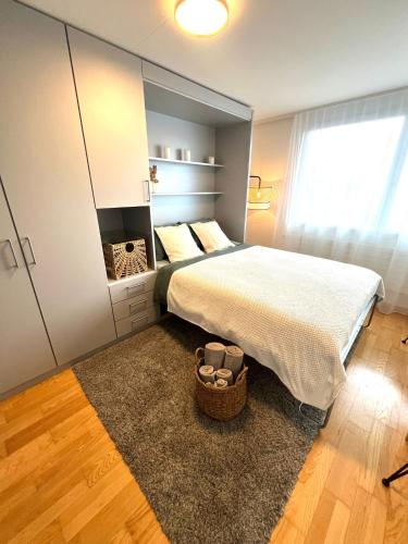 Katil atau katil-katil dalam bilik di Bijou Serene klitzekleine Wohnung mit Seeblick