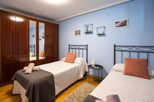 Posteľ alebo postele v izbe v ubytovaní Casa de pueblo con merendero y chimenea.