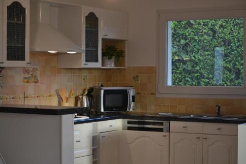 Dapur atau dapur kecil di Le Gite des 4 Vents