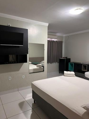 Postel nebo postele na pokoji v ubytování Hotel Boa Viagem