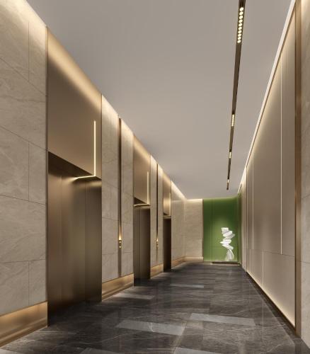 a hallway of a building with at Holiday Inn Changsha Malanshan by IHG in Changsha
