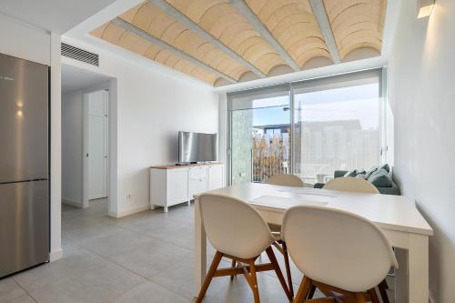Kuchyň nebo kuchyňský kout v ubytování Hauzify I Apartament Jardins d'Aro