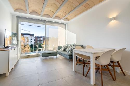 Posezení v ubytování Hauzify I Apartament Jardins d'Aro