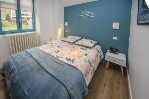 Postel nebo postele na pokoji v ubytování Hotel O Chiroulet