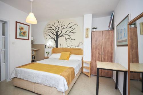 Postel nebo postele na pokoji v ubytování Beatrice Hospitality