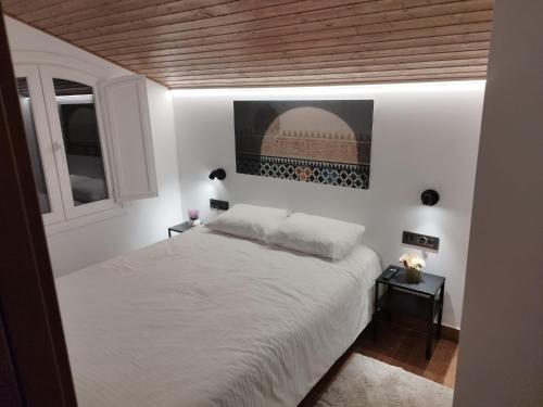 Giường trong phòng chung tại Sierra Nevada El Tesoro